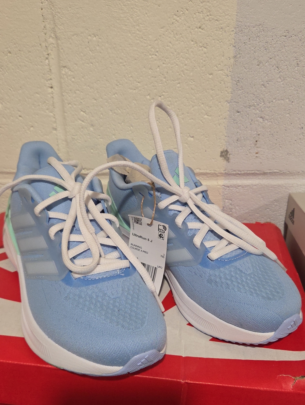 Light Blue Running Sneakers with White Accents